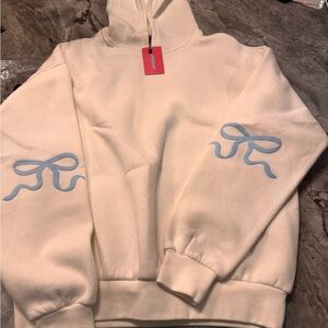 Edikted Women's Cream Hoodie with Blue Bow Accents
